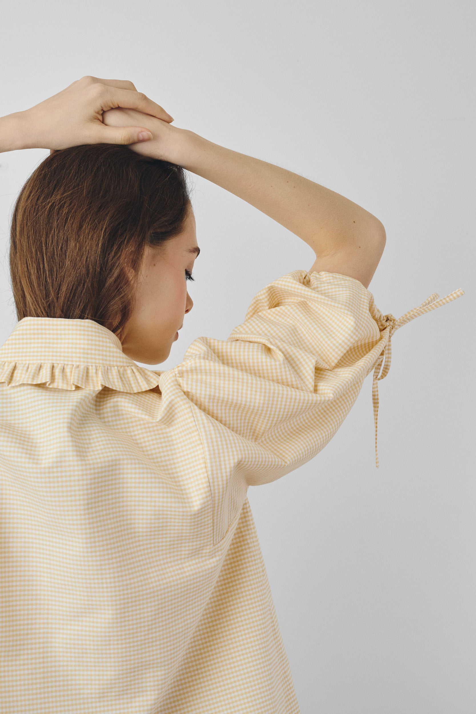 Yellow gingham shirt with ruffled collar