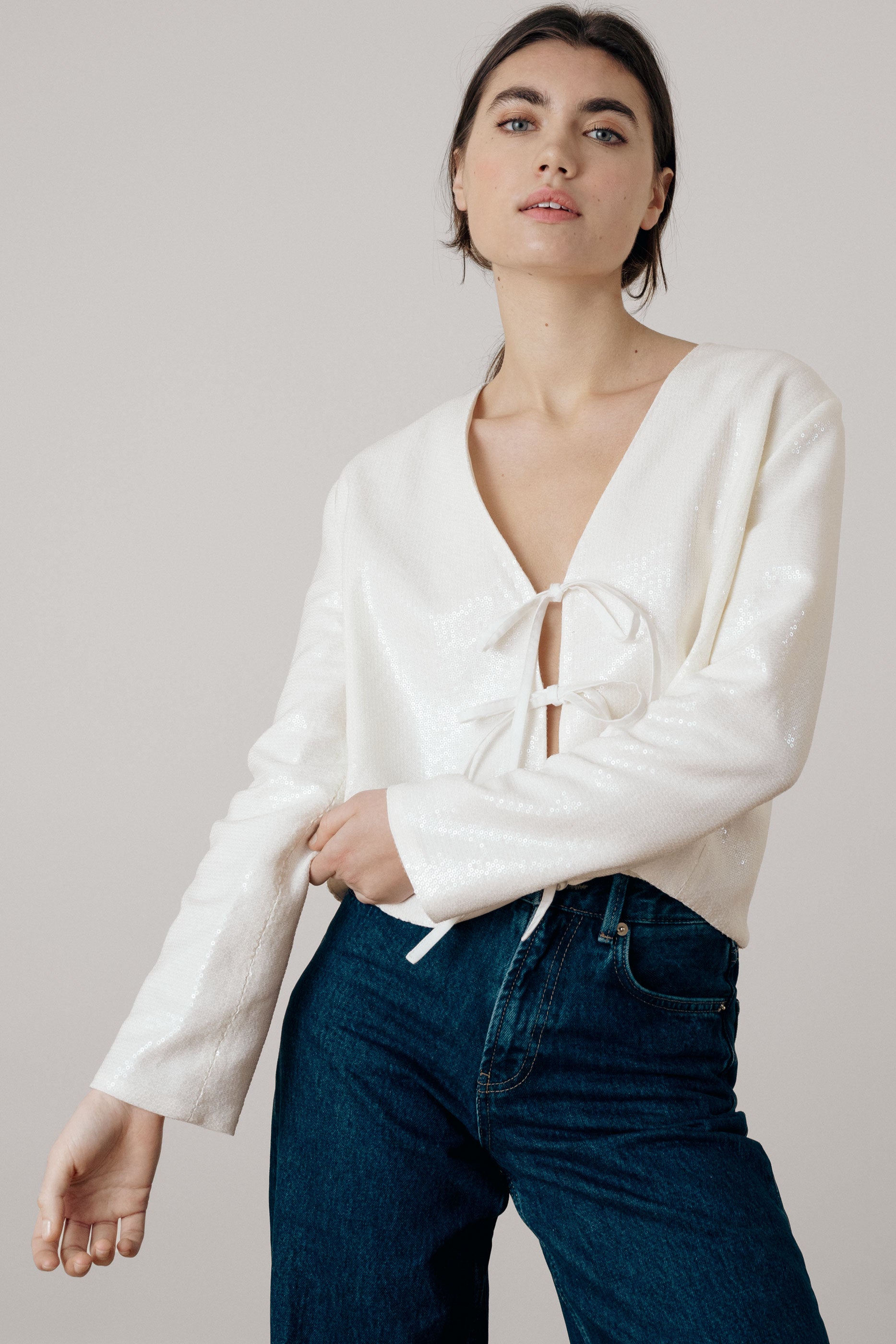 Ivory sequin knot blouse
