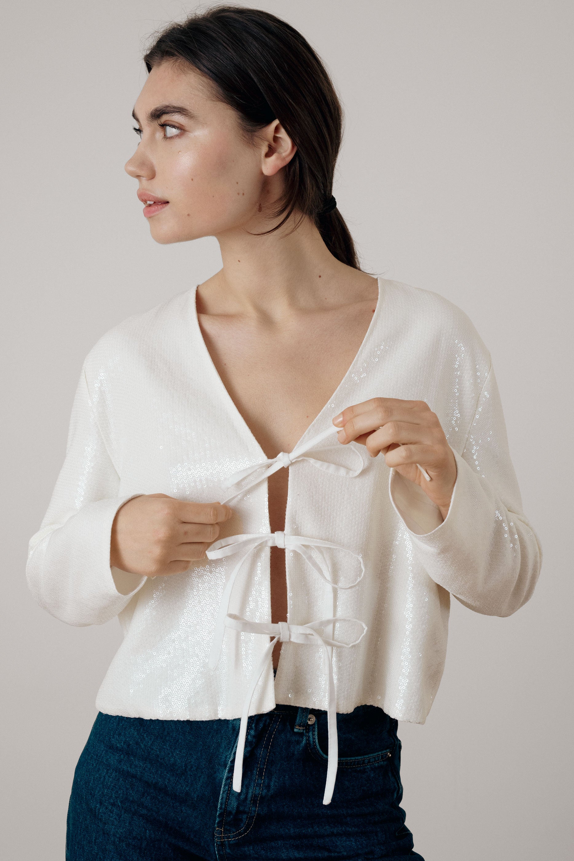 Ivory sequin knot blouse