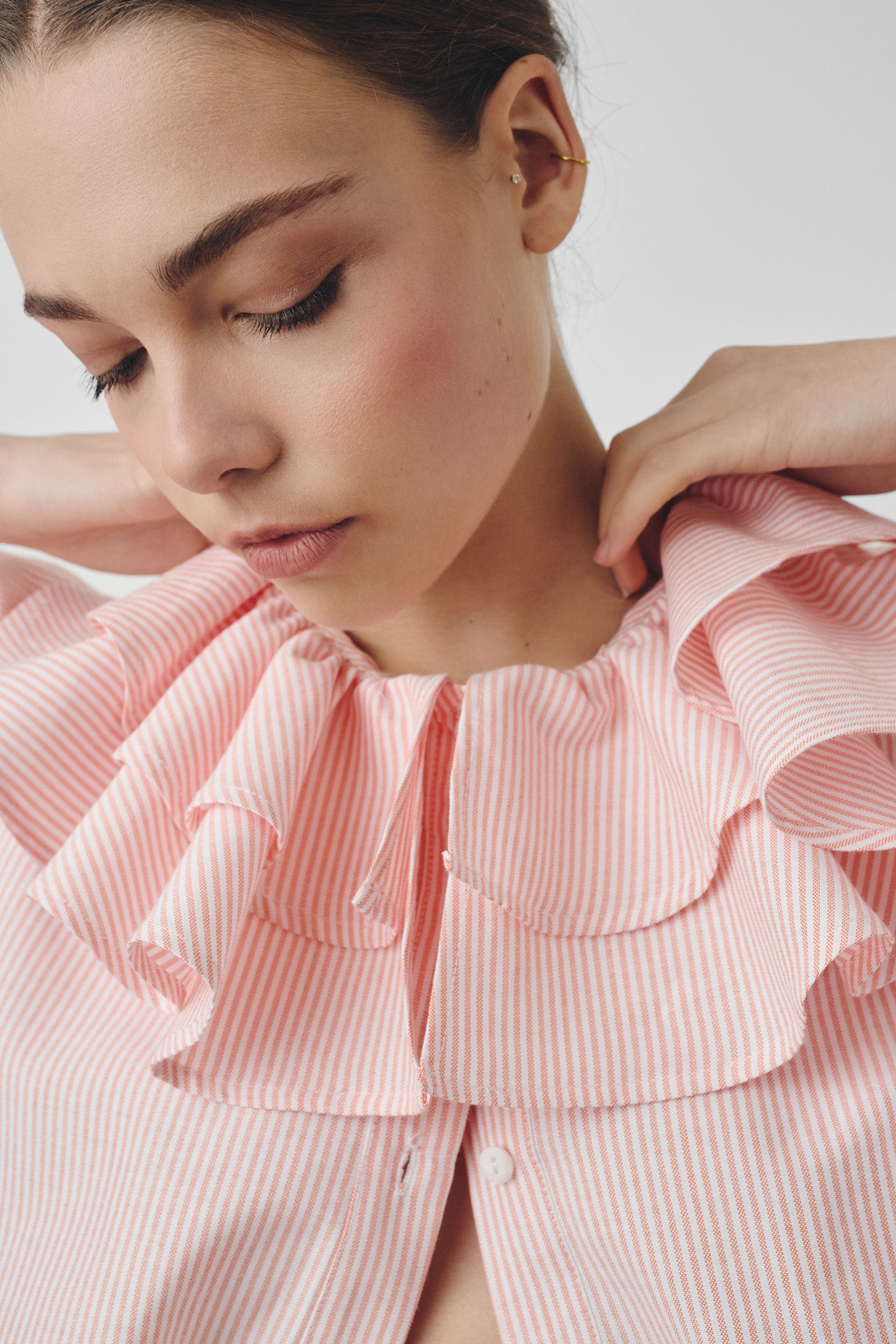Double ruffled shirt with orange stripes