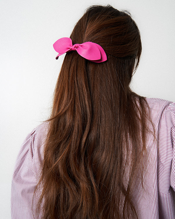 Barrette papillon cuir fuschia